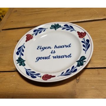 Boerenbont Tekstbord "Eigen haard is goud waard" rond 21cm aardewerk