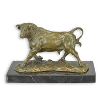 A BRONZE FIGURINE OF A BULL