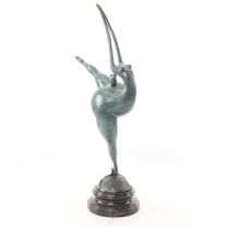 A MODERNIST BRONZE SCULPTURE OF A NUDE FEMALE DANCER