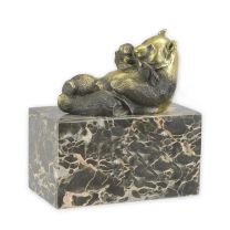 A BRONZE SCULPTURE OF AN EATING PANDA