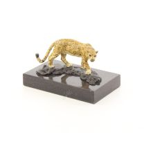 A BRONZE SCULPTURE OF A JAGUAR