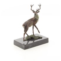 A BRONZE SCULPTURE OF A RED DEER