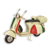 A TIN MODEL OF A SCOOTER