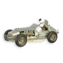 A TIN MODEL OF A FORMULA 1 RACE CAR
