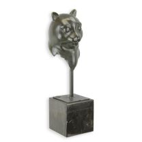 A BRONZE SCULPTURE OF A CATS HEAD
