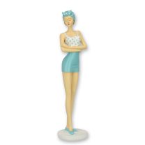 A RESIN FIGURINE OF A RETRO BEACH GIRL