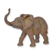 A RESIN FIGURINE OF AN ELEPHANT