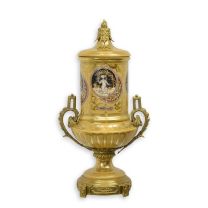 A BRONZE MOUNTED PORCELAIN URN