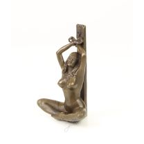 AN EROTIC BRONZE SCULPTURE OF A HANDCUFFED FEMALE NUDE