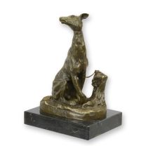 A BRONZE SCULPTURE OF A SITTING GREYHOUND
