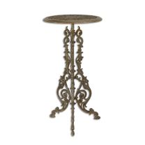 A CAST IRON PLANT TABLE, BROWN