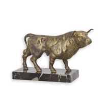 A CAST IRON SCULPTURE OF A BULL ON MARBLE BASE