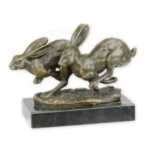 A BRONZE SCULPTURE OF TWO RUNNING HARES