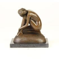 A BRONZE SCULPTURE CALLED DREAMS