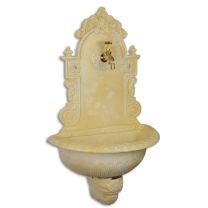 A CAST IRON WALL FOUNTAIN