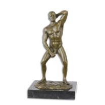 AN EROTIC BRONZE SCULPTURE OF A MALE NUDE
