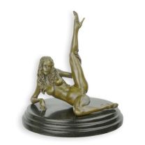 AN EROTIC BRONZE SCULPTURE OF A RECLINING FEMALE NUDE