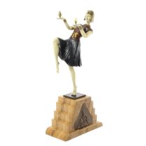 A COLD PAINTED BRONZE SCULPTURE CALLED "NUBIAN DANCER"