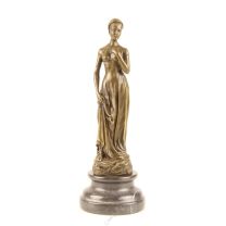 A BRONZE SCULPTURE OF A YOUNG WOMAN