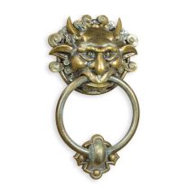 AN XXL CAST IRON DEVIL FACE DOORKNOCKER