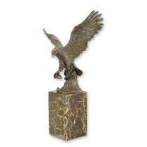 A BRONZE SCULPTURE OF A FISHING EAGLE