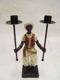 A RESIN VASSAL DOUBLE CANDLE HOLDER