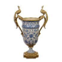 A BRONZE MOUNTED PORCELAIN VASE