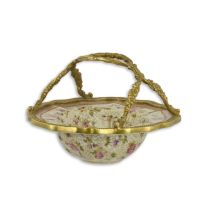 A BRONZE MOUNTED PORCELAIN BASKET