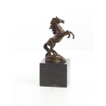 A BRONZE SCULPTURE OF A REARING STALLION