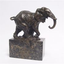 A BRONZE SCULPTURE OF A WALKING ELEPHANT