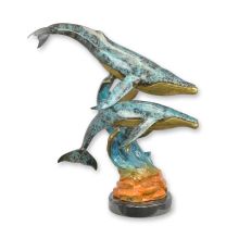 A BRONZE SCULPTURE OF A COUPLE OF WHALES