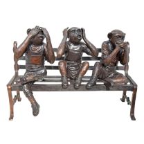 A BRONZE SCULPTURE OF 3 MONKEYS ON A BENCH