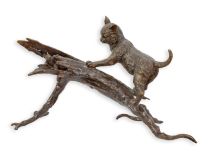 A BRONZE SCULPTURE OF A CAT AND RAT ON A LOG