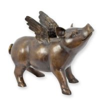 A BRONZE SCULPTURE OF A FLYING PIG