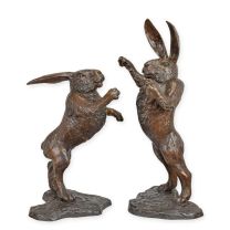 A PAIR OF BRONZE BOXING HARES
