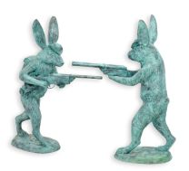 A PAIR OF TWO BRONZE HUNTING HARES