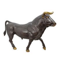 A BRONZE LARGE STANDING BULL