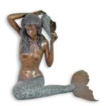 A BRONZE MERMAID FOUNTAIN