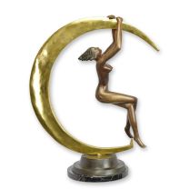 A BRONZE SCULPTURE OF A FEMALE NUDE AND CRESCENT MOON
