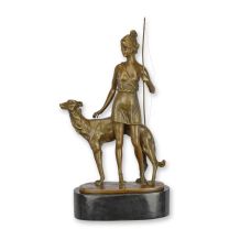A BRONZE SCULPTURE OF DIANA WITH HOUND