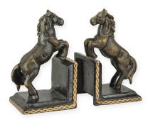 A PAIR OF CAST IRON HORSE BOOKENDS