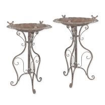 A PAIR OF IRON BIRD BATHS - WEATHERED GREY