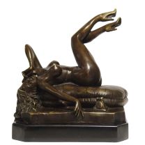 AN EROTIC BRONZE SCULPTURE OF A FEMALE NUDE ON THE TELEPHONE